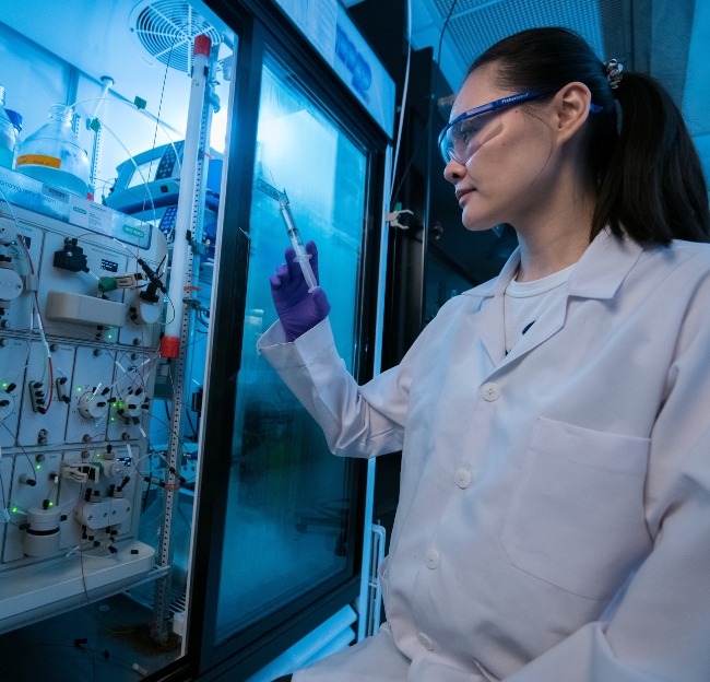 UM scientist conducts research in a lab.